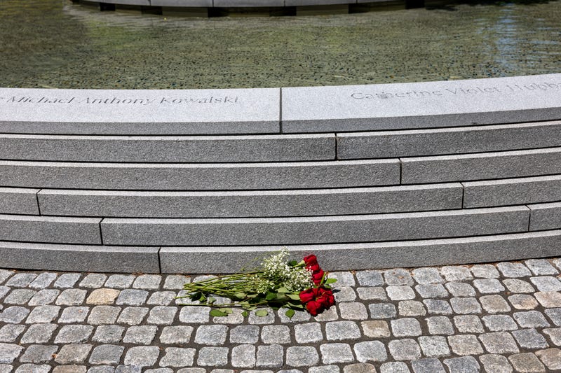 A bouquet of flowers is left at a memorial to the victims of the Sandy Hook School shooting on Gun Violence Awareness Day on June 07, 2024 in Sandy Hook, Connecticut.