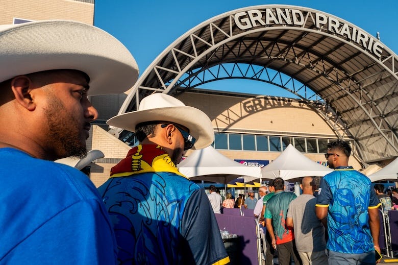 Sri Lanka Cricket fans wait in line ahead of the 2024 World Cup game between Sri Lanka and Bangladesh at Grand Prairie Stadium