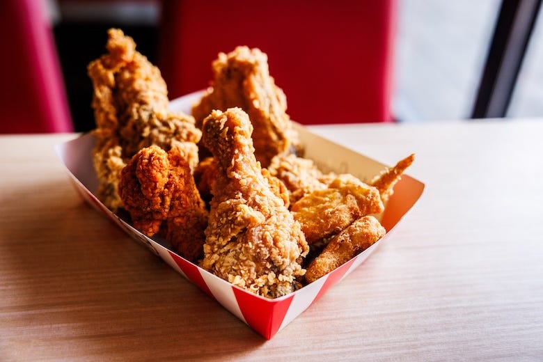 Basket of fried chicken on a table