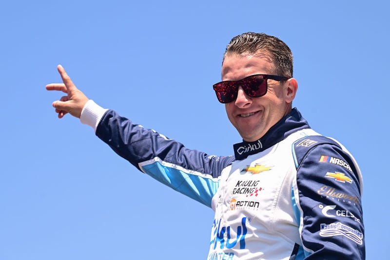 AJ Allmendinger, driver of the #16 Cirkul Chevrolet, waves to fans as he walks onstage during driver intros prior to the NASCAR Cup Series Toyota/Save Mart 350 at Sonoma Raceway on June 09, 2024 in Sonoma, California.