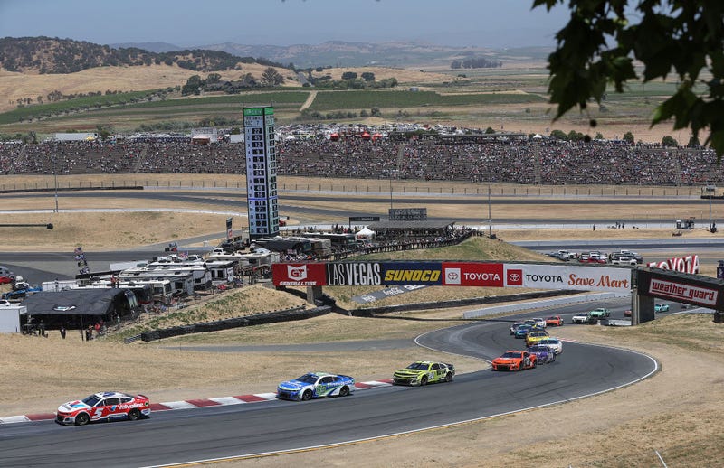 Kyle Larson, driver of the #5 Valvoline Chevrolet, leads the field during the NASCAR Cup Series Toyota/Save Mart 350 at Sonoma Raceway on June 09, 2024 in Sonoma, California.