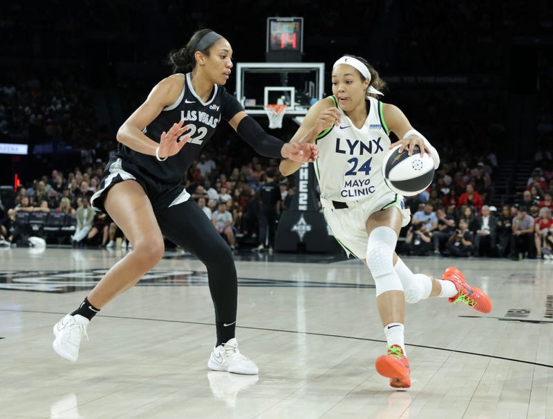 Napheesa Collier #24 of the Minnesota Lynx drives against A'ja Wilson #22 of the Las Vegas Aces in the second quarter of their game at Michelob ULTRA Arena on June 11, 2024 in Las Vegas, Nevada.