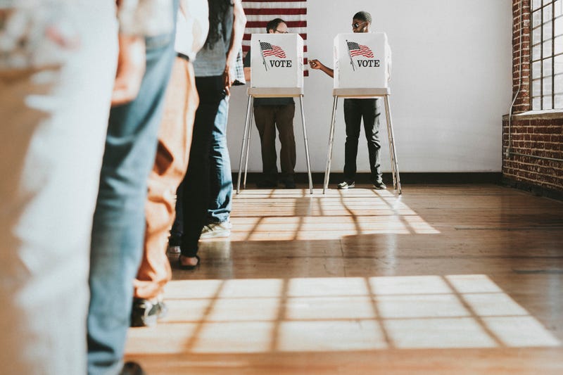 Voters at ballot box
