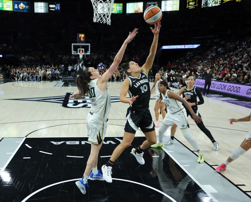 Kelsey Plum #10 of the Las Vegas Aces shoots against Breanna Stewart #30 of the New York Liberty in the second quarter of their game at Michelob ULTRA Arena on June 15, 2024 in Las Vegas, Nevada.
