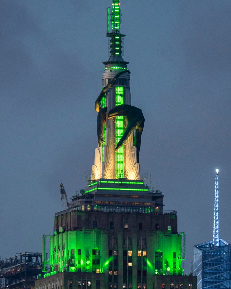 The Empire State Building is lit in green with a giant inflatable green dragon to mark the new season of Max/HBO's series "House of the Dragon" on June 16, 2024