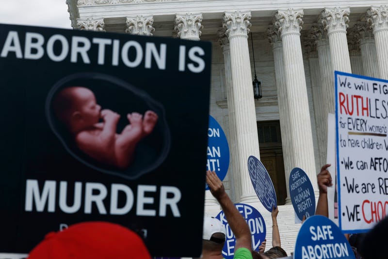 Abortion rights and anti-abortion rights activists participate in a protest outside of the U.S. Supreme Court building on June 24, 2024, in Washington, D.C. 