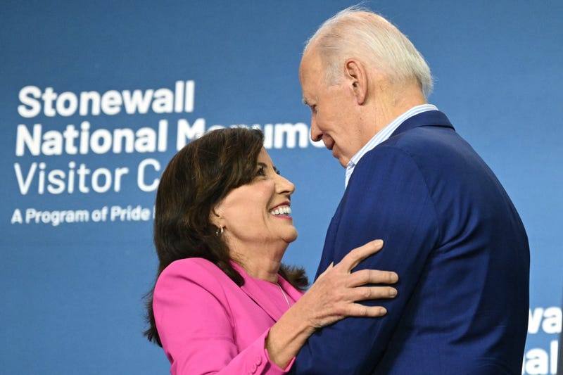 Gov. Kathy Hochul and President Joe Biden embrace during the Stonewall National Monument Visitor Center grand opening ceremony in New York on June 28, 2024