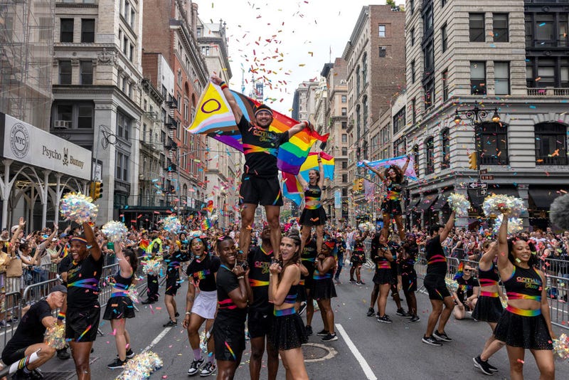 New Yorkers celebrate during the annual Pride March into the West Village on June 30, 2024 in New York City. 