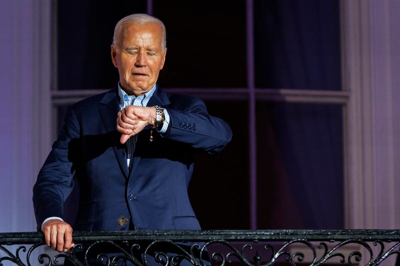 Joe Biden checking his watch