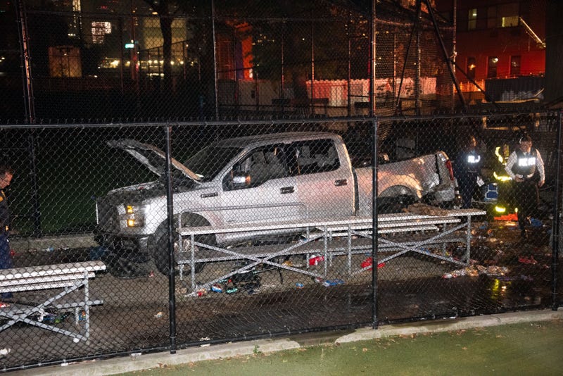 Firefighters and police respond after multiple people were struck by a pickup truck at Corlears Hook Park on the Lower East Side on July 4, 2024