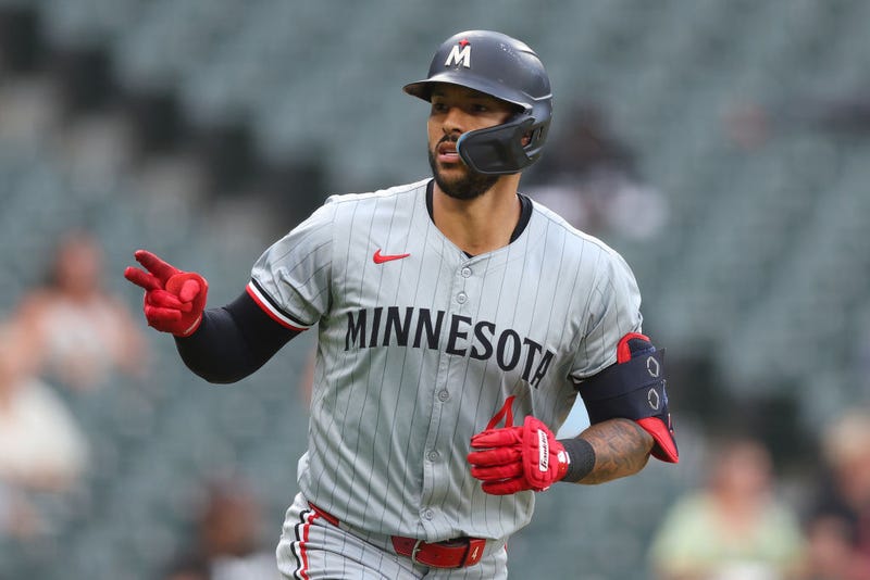 Carlos Correa #4 of the Minnesota Twins reacts after hitting a solo home run off Drew Thorpe #33 of the Chicago White Sox (not pictured) during the sixth inning at Guaranteed Rate Field on July 10, 2024 in Chicago, Illinois.