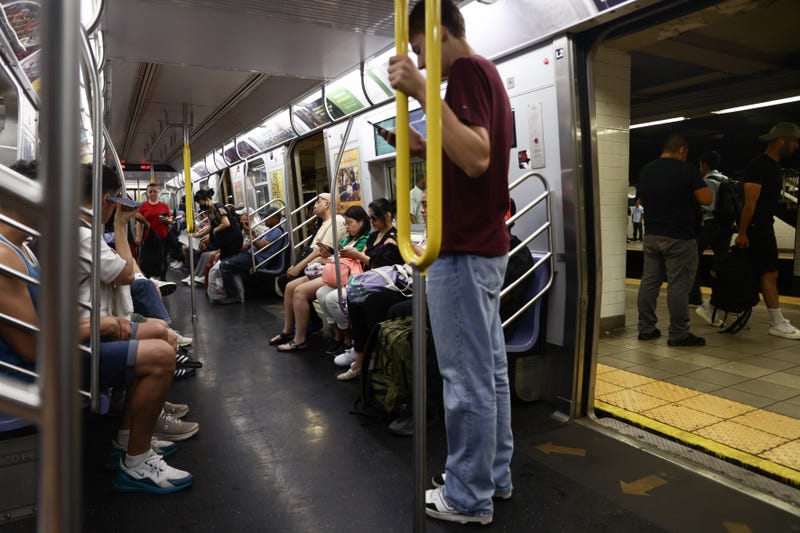 Subway riders are seen on a train on July 13, 2024. Riders have told the MTA in surveys that safety is among their cop concerns along with service reliability