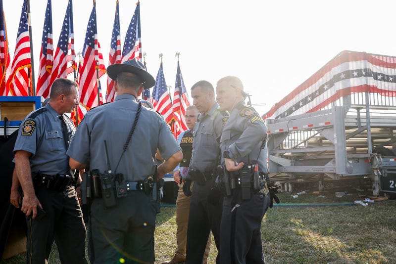 Law enforcement agents stand near the stage of a campaign rally for Republican presidential candidate former President Donald Trump on July 13, 2024 in Butler, Pennsylvania.