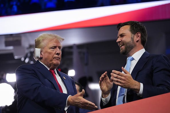 Republican presidential candidate, former U.S. President Donald Trump (L) and Republican Vice Presidential candidate, U.S. Sen. J.D. Vance (R-OH) appear on the first day of the Republican National Convention at the Fiserv Forum on July 15, 2024 in Milwaukee, Wisconsin.