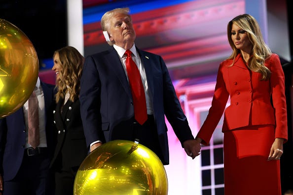 Republican presidential nominee, former U.S. President Donald Trump and Former first lady Melania Trump on stage and the conclusion of the fourth day of the Republican National Convention at the Fiserv Forum on July 18, 2024 in Milwaukee, Wisconsin. 