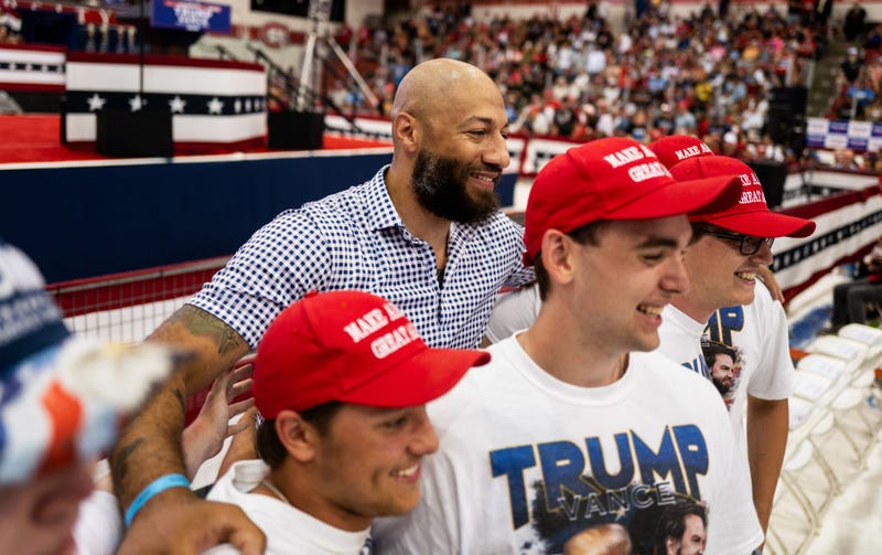 Republican candidate for Senate Royce White (C) poses for a photo before a rally featuring U.S. Republican Presidential nominee former President Donald Trump and Republican vice presidential nominee U.S. Sen. J.D. Vance (R-OH).