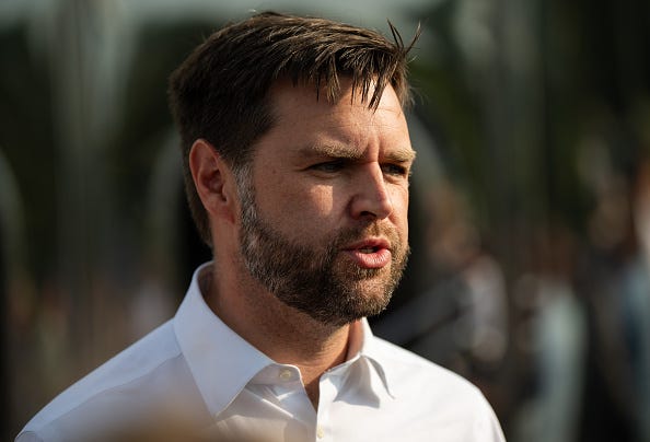 Republican vice presidential nominee U.S. Sen. J.D. Vance (R-OH) speaks with media gathered outside the Park Diner on July 28, 2024 in St Cloud, Minnesota.