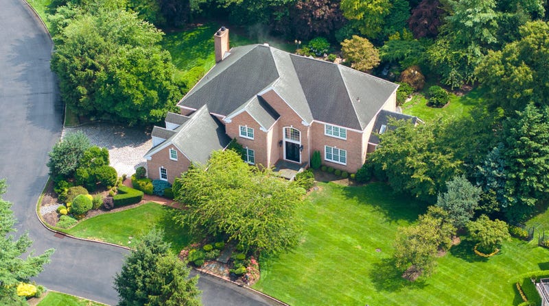 An aerial view shows the Saxony Court home in Manhasset, New York, belonging to Chris Hu and Linda Sun, on July 24, 2024