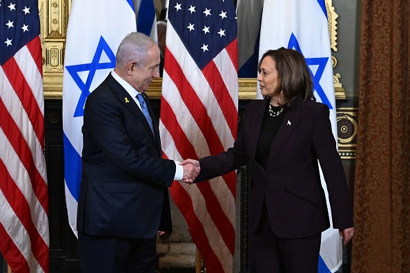 U.S. Vice President Kamala Harris and Israeli Prime Minister Benjamin Netanyahu shake hands before the start of a meeting in the Vice President's ceremonial office in the Eisenhower Executive Office Building on July 25, 2024 in Washington, DC.