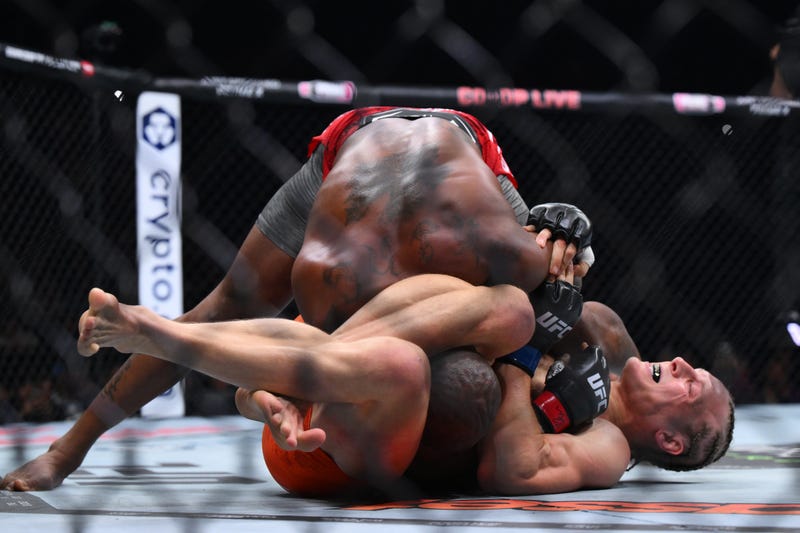 Paddy Pimblett (bottom) of England secures a submission against King Green of the U.S. in a lightweight bout during the UFC 304 event at Co-op Live on July 28, 2024 in Manchester, England.