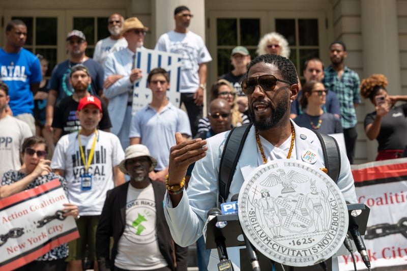 New York City Public Advocate Jumaane Williams joins activists, family members and those formally incarcerated as they participate in a rally and news conference outside of City Hall to denounce Mayor Eric Adams' actions on solitary confinement on July 29, 2024