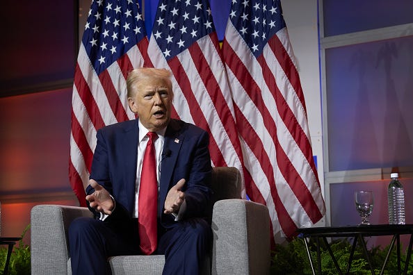 Republican presidential candidate former President Donald Trump participates in a question and answers session at the National Association of Black Journalists (NABJ) convention at the Hilton Hotel on July 31, 2024 in Chicago, Illinois. 