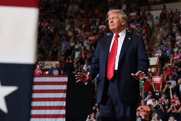 Republican presidential nominee, former U.S. President Donald Trump walks onstage at a rally on July 31, 2024 in Harrisburg, Pennsylvania.