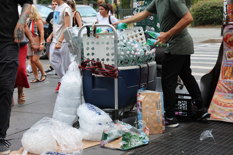 Bottled water overflows out of a street vendor's cooler near City Hall on Aug. 1, 2024