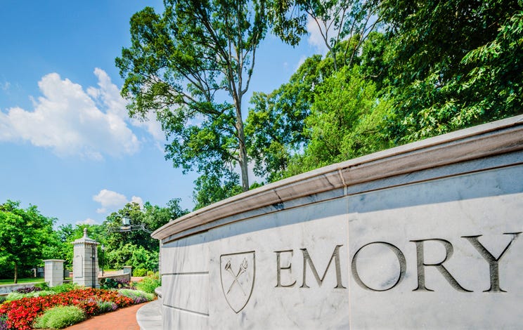 Flowers bloom at the entrance to Emory University, July 7, 2014, in Atlanta, Georgia. Emory was founded in 1836 and is a private research university and liberal arts college. It is consistently ranked as one of the best colleges in the United States.