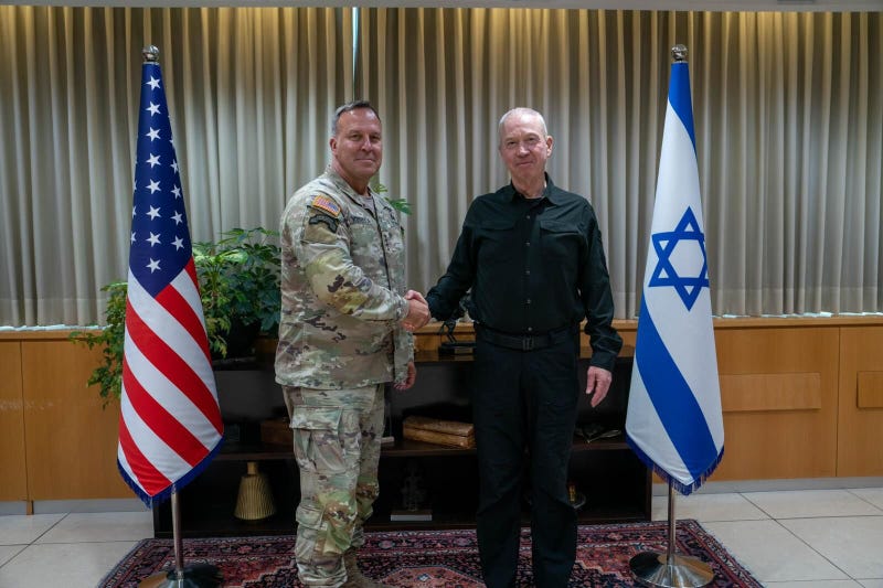 Israeli Defense Minister Yoav Gallant (R) and Commander of United States Central Command (CENTCOM) Michael Erik Kurilla (L) shakes hands as they meet in Tel Aviv, Israel on August 5, 2024.