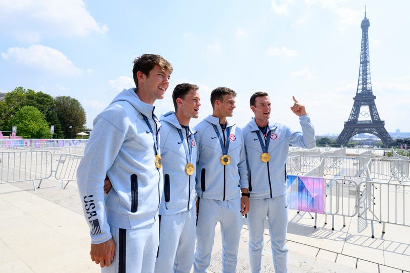 From left: Olympians Nick Mead, Justin Best, Michael Grady and Liam Corrigan of Team USA pose on the TODAY show set in front of the Eiffel Tower on Aug. 2, 2024, in Paris, France. 