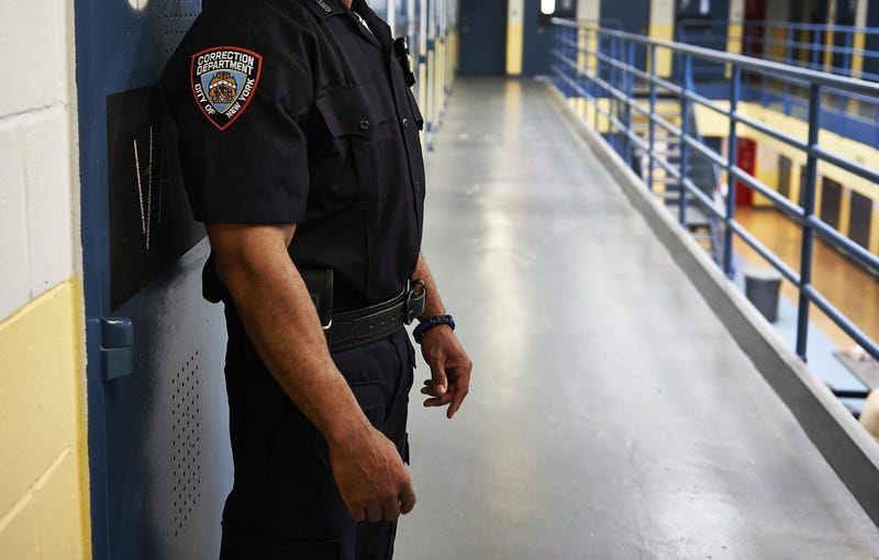 A New York City Department of Correction officer is pictured in Rikers Island's George R. Vierno Center