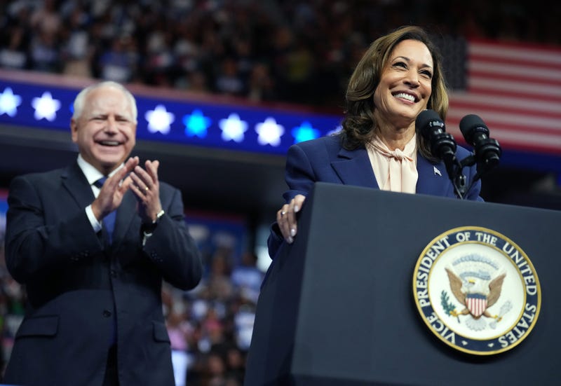 Kamala Harris and Tim Walz speaking at a rally in the Liacouras Center in North Philadelphia.