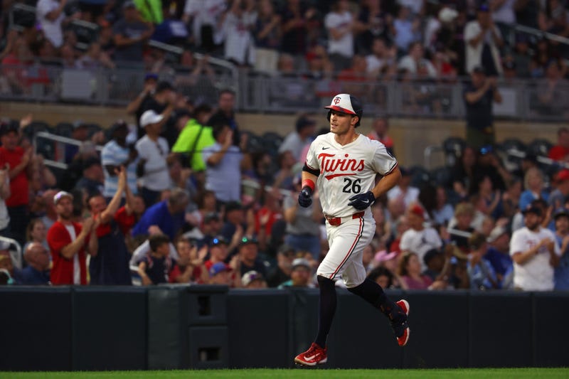 Max Kepler #26 of the Minnesota Twins rounds the bases on his three-run home run in the sixth inning against the Kansas City Royals at Target Field on August 13, 2024 in Minneapolis, Minnesota.