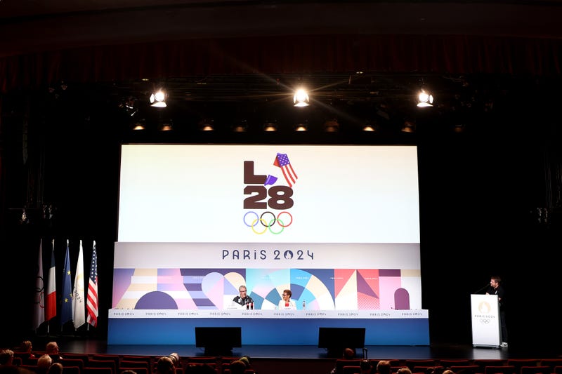 PARIS, FRANCE - AUGUST 10: A general view as the LED screen, depicting the LA28 Olympics logo, is seen whilst Casey Wasserman, LA28 Chairperson and President, and Karen Bass, Mayor of Los Angeles, speak at the LA28 Press Conference on day fifteen of the Olympic Games Paris 2024 at the Main Press Centre on August 10, 2024 in Paris, France.