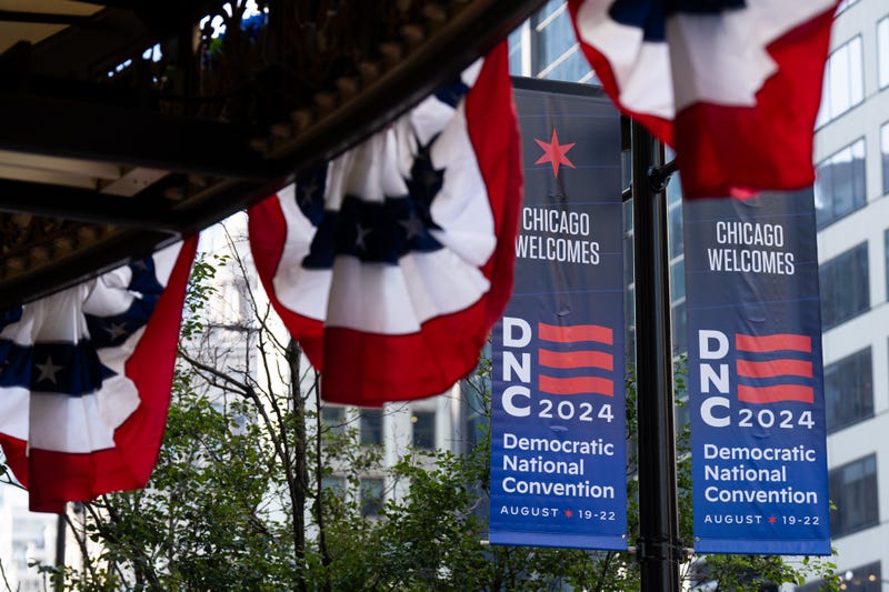 Banners and bunting decorate the outside of a downtown Chicago  hotel