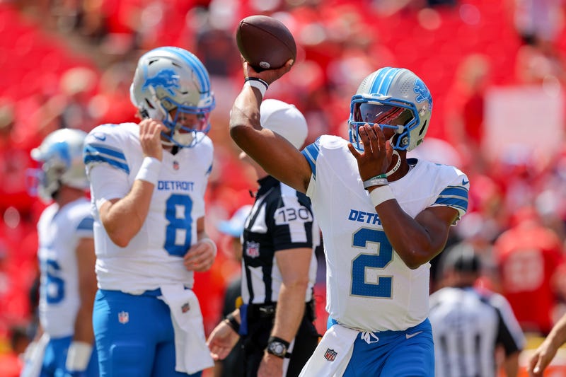 Lions QBs Nate Sudfeld, left, and Hendon Hooker