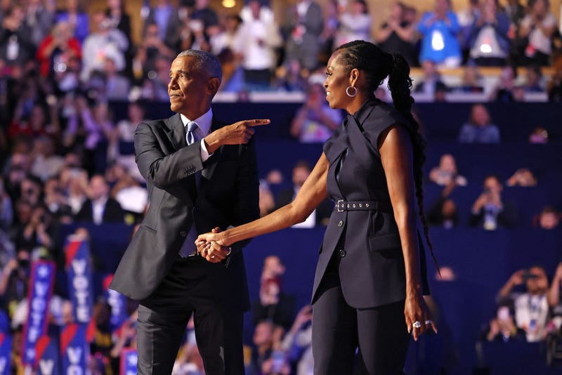 Former first lady Michelle Obama introduces former President Barack Obama on the second day of the Democratic National Convention at the United Center in Chicago.