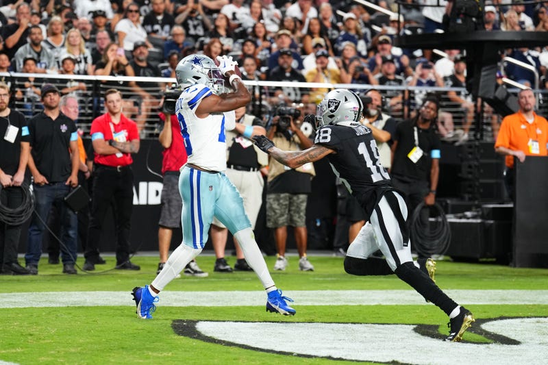 Wide receiver Ryan Flournoy #18 of the Dallas Cowboys catches a 1-yard touchdown pass during the first half of a preseason game against the Las Vegas Raiders at Allegiant Stadium on August 17, 2024 in Las Vegas, Nevada.