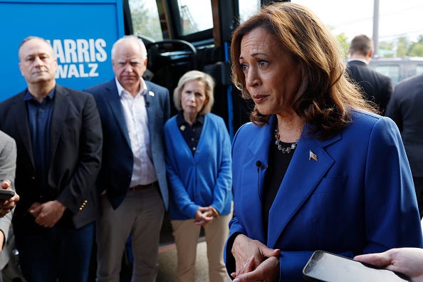 Democratic presidential candidate, U.S. Vice President Kamala Harris speaks to reporters outside of Primanati Bros. 