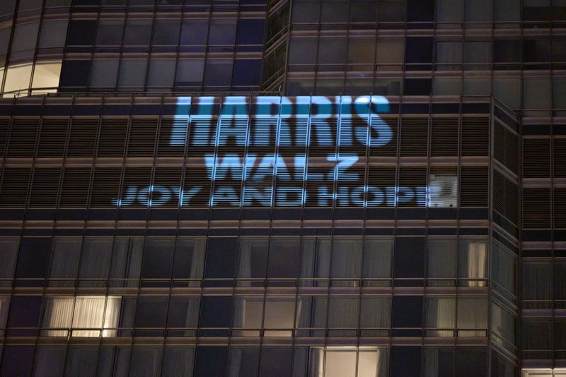 Democratic National Committee projects images on Trump Tower