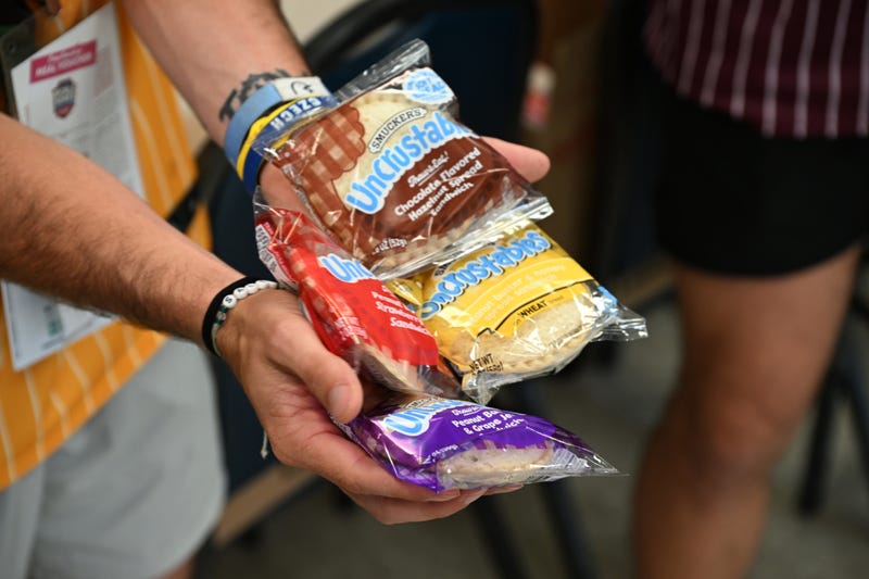 J.M. Smucker is suing Trader Joe’s, saying its new frozen peanut butter and jelly sandwiches are too similar to Smucker’s Uncrustables in their design and packaging.