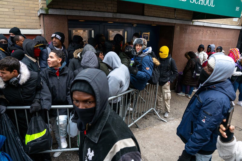 Migrants seek shelter at the NYPD's 7th Precinct stationhouse earlier this year