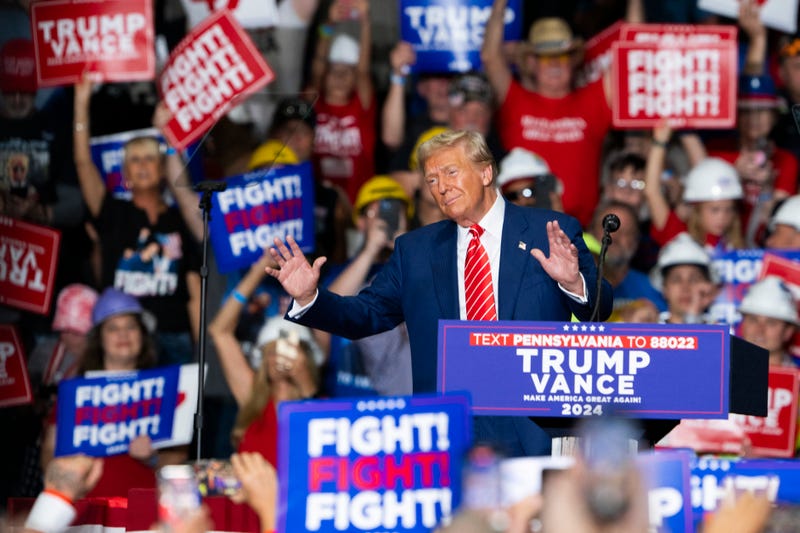Donald Trump gestures as he speaks during a rally at 1st Summit Arena at the Cambria County War Memorial in Johnstown, Pennsylvania, on Aug. 30, 2024