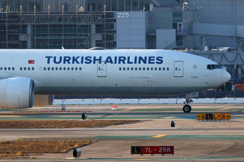 The flight landed at JFK Airport after the pilot died midflight, officials said