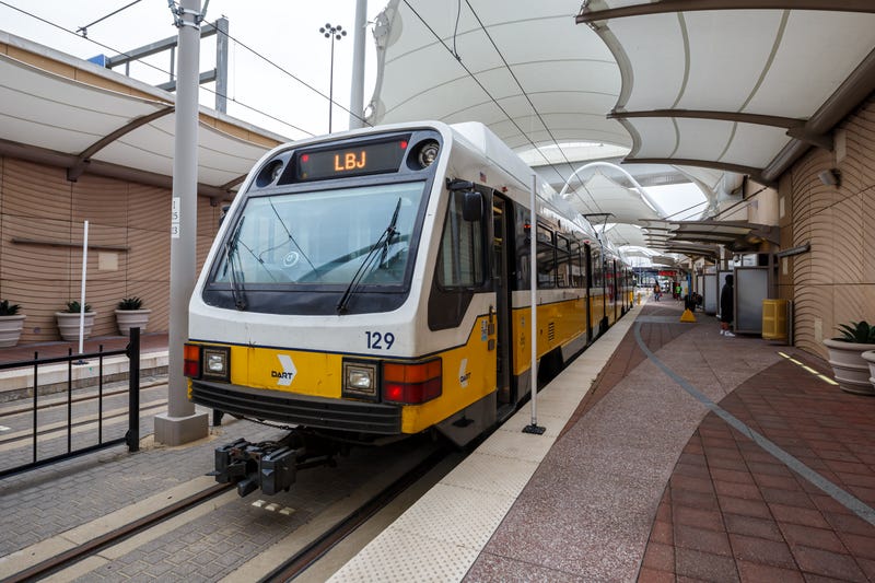 DART light rail public transport at DFW Airport station.