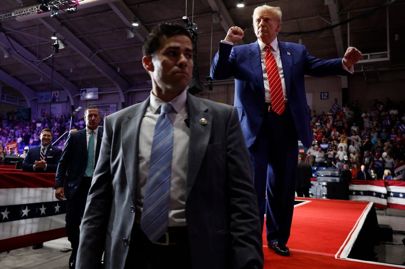 JOHNSTOWN, PENNSYLVANIA - AUGUST 30: Surrounded by U.S. Secret Service agents, Republican presidential nominee, former U.S. President Donald Trump dances his way off stage in the 1st Summit Arena at the Cambria County War Memorial on August 30, 2024 in Johnstown, Pennsylvania. Promising to cut energy bills in half, conduct the largest deportation operation in history and put a 200% tariff on foreign made automobiles, Trump rallied his supporters in the all-important battleground state of Pennsylvania. (Photo by Chip Somodevilla/Getty Images)