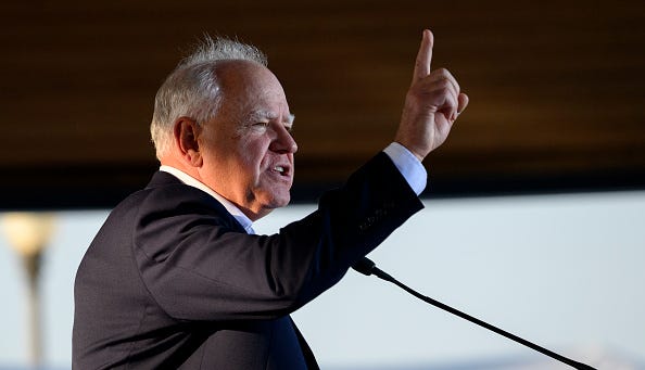 Democratic vice presidential nominee Minnesota Governor Tim Walz speaks to a gathered crowd of supporters