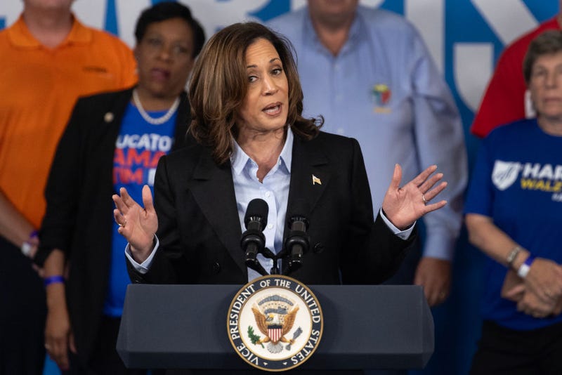 DETROIT, MICHIGAN - SEPTEMBER 02: Flanked by labor union leaders, Democratic presidential candidate Vice President Kamala Harris speaks to union workers during a campaign event on September 02, 2024 at Northwestern High School in Detroit, Michigan. Harris is scheduled to host another event in Pennsylvania later in the day.