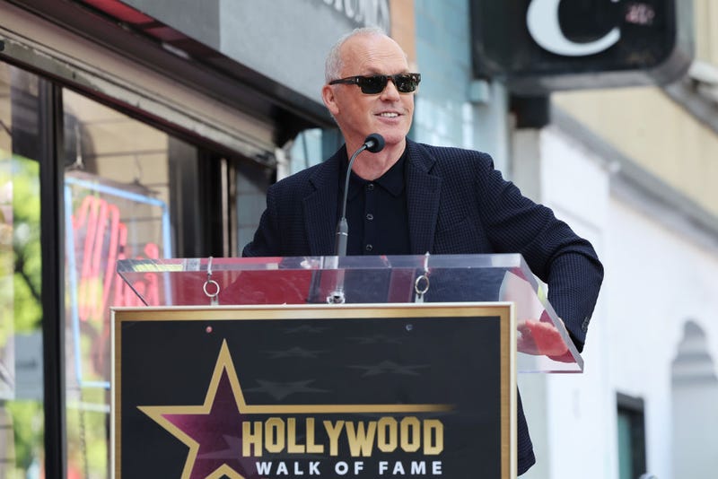  Michael Keaton speaks at Time Burton's Hollywood Walk of Fame Star ceremony on September 03, 2024 in Hollywood, California. 